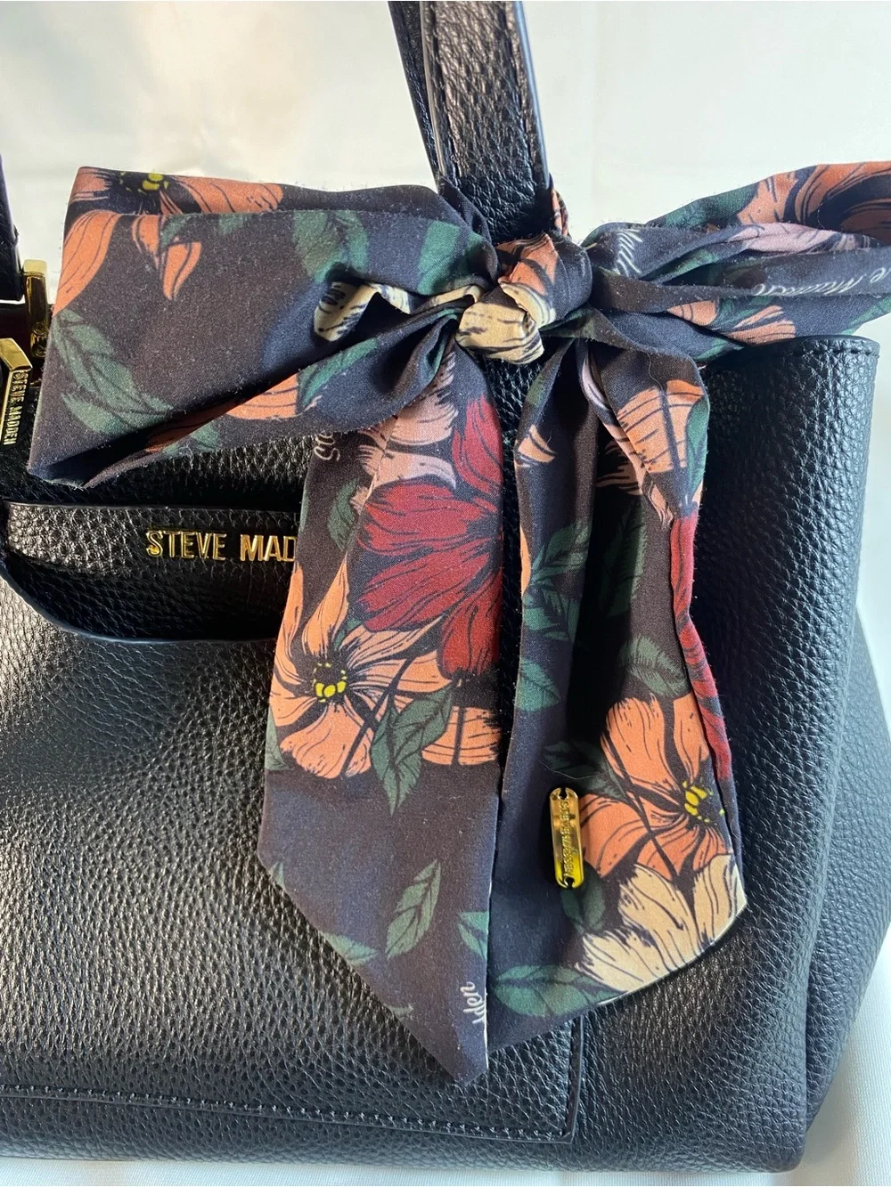 Steve Madden Black Pebbled faux leather purse with Floral Scarf Accent